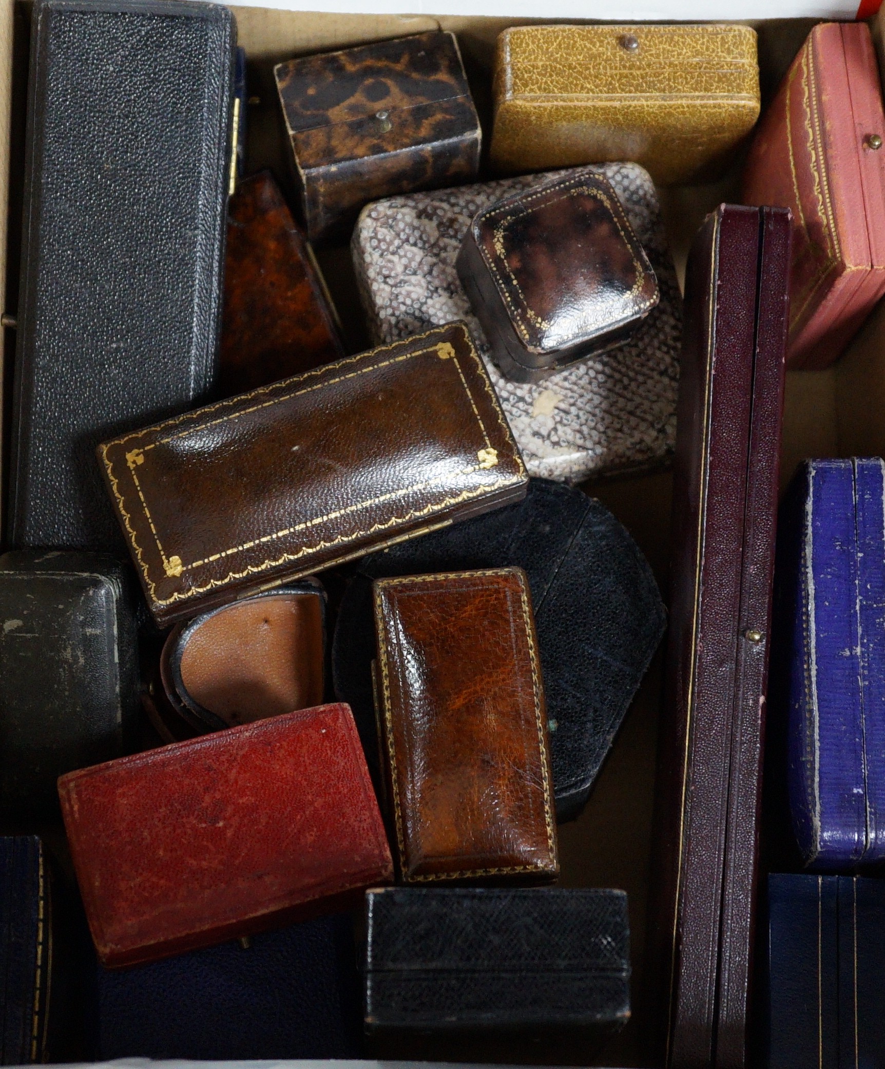 A group of assorted jewellery boxes, including gilt tooled leather.